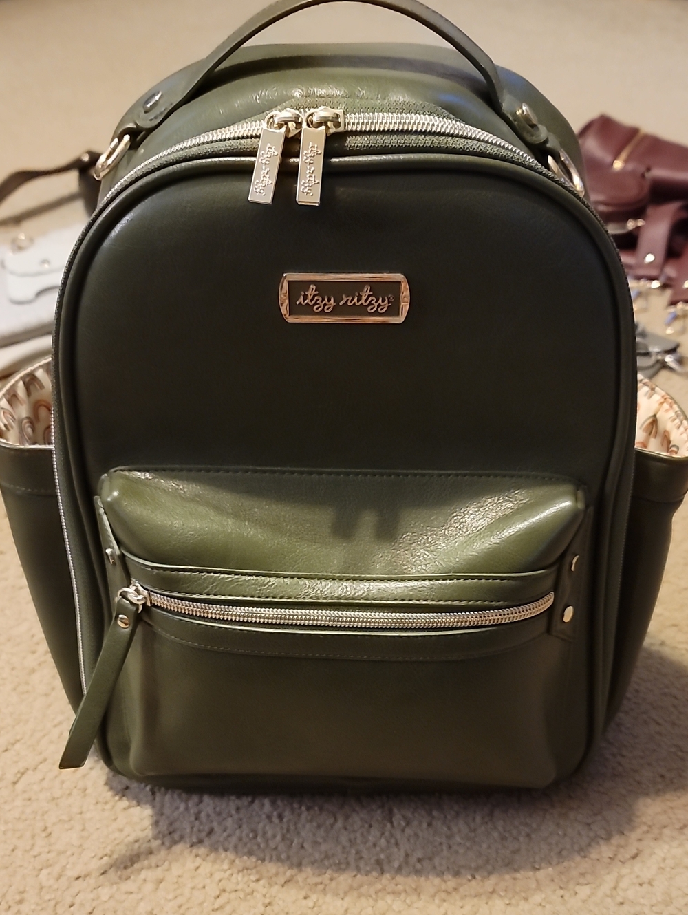 Itzy Ritzy Olive Green Mini Backpack with Front Zip Pocket
